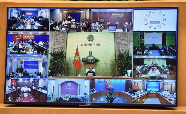 Cuộc họp có sự tham dự của 22 tỉnh, thành phố tại các đầu cầu trực tuyến. Ảnh: VGP/Đức Tuân