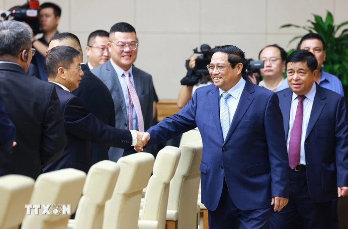Thủ tướng Phạm Minh Chính với các doanh nghiệp Trung Quốc tiêu biểu trong lĩnh vực phát triển kinh tế xanh, kinh tế số. (Ảnh: Dương Giang/TTXVN) Thủ tướng Phạm Minh Chính với các doanh nghiệp Trung Quốc tiêu biểu trong lĩnh vực phát triển kinh tế xanh, kinh tế số. (Ảnh: Dương Giang/TTXVN)