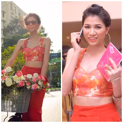 Trang Trần không phải là một người mẫu có vòng em lý tưởng, nhưng phần bụng của cô cũng khá phẳng, vì thế nên cô mix một chiếc crop top với quần cạp cao, khoảng hở vừa phải khiến cô thật sexy mà đủ tinh tế.