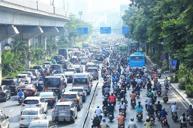 Người tham gia giao thông trên tuyến đường Nguyễn Trãi-Ngã Tư Sở. (Ảnh: Tuấn Anh/TTXVN) Người tham gia giao thông trên tuyến đường Nguyễn Trãi-Ngã Tư Sở. (Ảnh: Tuấn Anh/TTXVN)