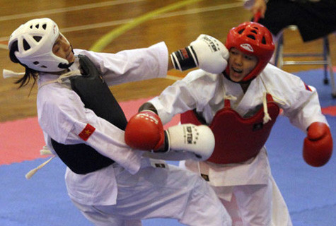 Nguyễn Thùy Dương (giáp đen) giành HCV Kempo. Ảnh: TNO