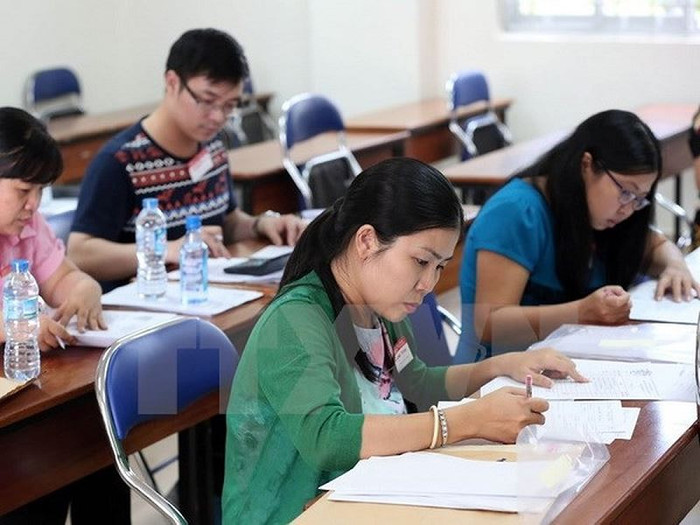Chấm thi luôn được xem là một nhiệm vụ rất vất vả, nặng nề. (Ảnh minh họa: TTXVN) Chấm thi luôn được xem là một nhiệm vụ rất vất vả, nặng nề. (Ảnh minh họa: TTXVN)