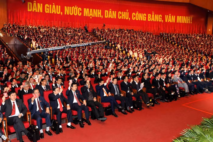 Các đại biểu biểu quyết tại phên trù bị sáng 20/1. Ảnh TTXVN