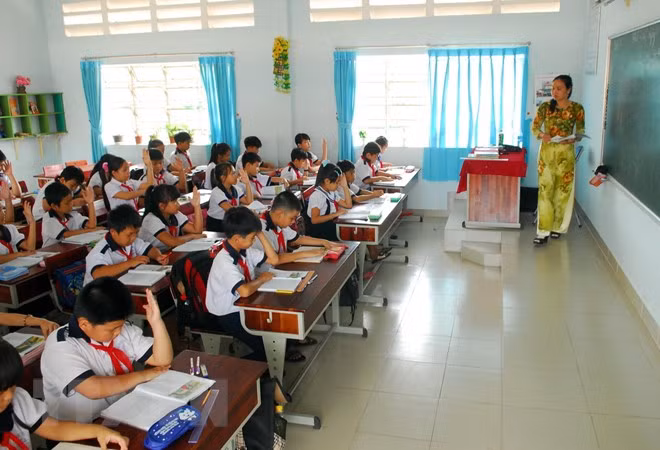 Giáo viên háo hức, phấn khởi về việc tổ chức xét thăng hạng giáo viên (Ảnh minh họa: TTXVN).