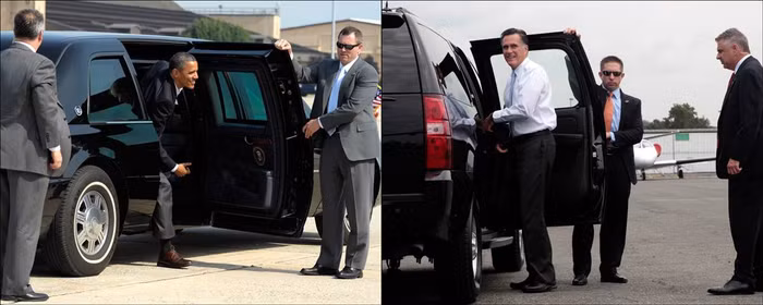 Được các vệ sỹ hộ tống, bảo vệ.