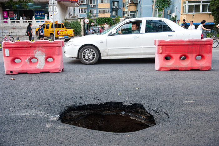 Hiểm họa rình rập đối với các phương tiện lưu thông ở Bắc Kinh Hiểm họa rình rập đối với các phương tiện lưu thông ở Bắc Kinh