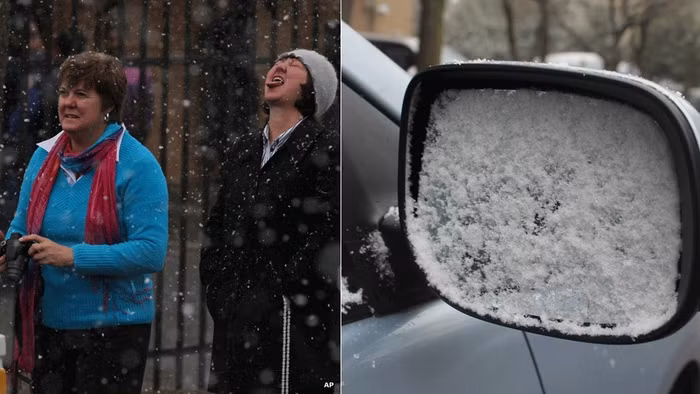 Người dân hứng thú với kiểu thời tiết hiếm có ở "thủ đô kinh tế" của Nam Phi.