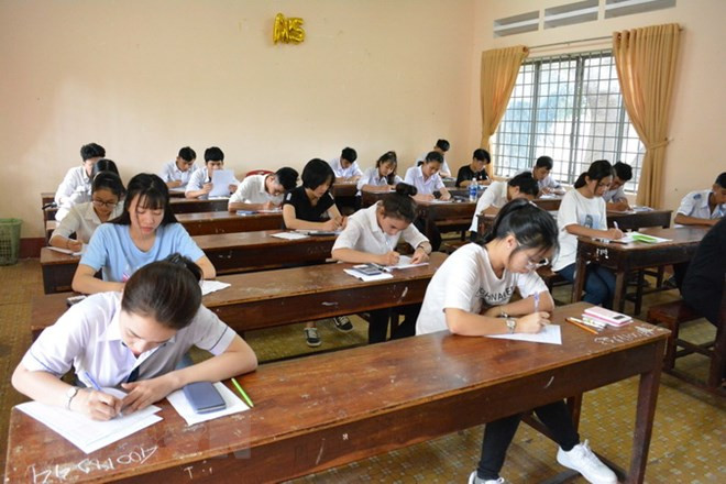 Thí sinh tham gia kỳ thi trung học phổ thông quốc gia 2018. (Ảnh: Tuấn Anh/TTXVN) Thí sinh tham gia kỳ thi trung học phổ thông quốc gia 2018. (Ảnh: Tuấn Anh/TTXVN)
