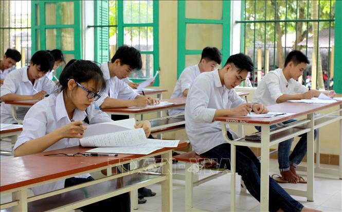 Học sinh làm bài kiểm tra (Ảnh minh họa: TTXVN). Học sinh làm bài kiểm tra (Ảnh minh họa: TTXVN).