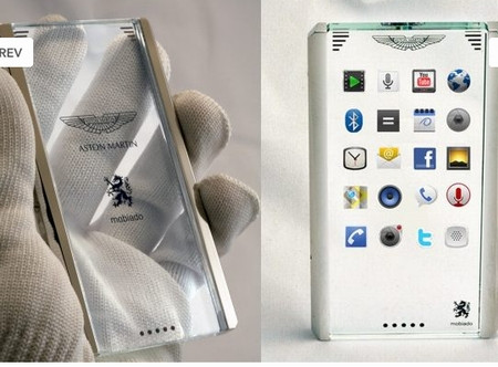 7. Điện thoại trong suốt cho xe sang: Nhà sản xuất nổi tiếng với các ôtô siêu sang- Aston Martin và công ty sản xuất điện thoại di động Canada- Bobiado đã hợp tác cùng tạo ra mẫu điện thoại tinh xảo - CPT002, điện thoại này được thiết kế trong suốt và trang bị màn hình cảm ứng điện dung. Ý tưởng này cũng có nhiều tính năng khiến người dùng mê mẩn. Hơn nữa, các nhà sáng tạo đã có kế hoạch tích hợp điện thoại này trên các các xe hơi Aston Martin 7. Điện thoại trong suốt cho xe sang: Nhà sản xuất nổi tiếng với các ôtô siêu sang- Aston Martin và công ty sản xuất điện thoại di động Canada- Bobiado đã hợp tác cùng tạo ra mẫu điện thoại tinh xảo - CPT002, điện thoại này được thiết kế trong suốt và trang bị màn hình cảm ứng điện dung. Ý tưởng này cũng có nhiều tính năng khiến người dùng mê mẩn. Hơn nữa, các nhà sáng tạo đã có kế hoạch tích hợp điện thoại này trên các các xe hơi Aston Martin