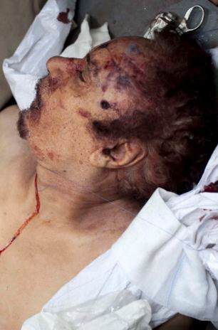 Thi thể Gaddafi lúc đã chết Thi thể Gaddafi lúc đã chết