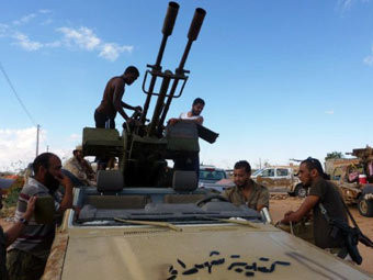 Các tay súng của NTC ở ngoại ô thành phố Sabha Các tay súng của NTC ở ngoại ô thành phố Sabha