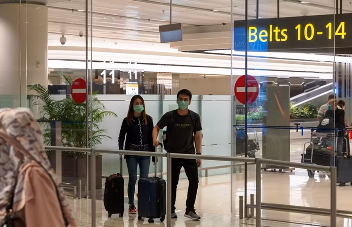 Du khách quốc tế đến Sân bay Changi, Singapore. Du khách quốc tế đến Sân bay Changi, Singapore.