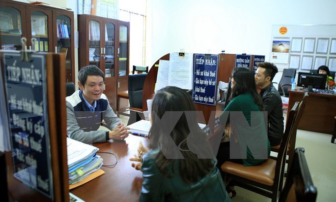 Chính phủ yêu cầu tiếp tục đẩy mạnh cải cách thủ tục hành chính. ảnh minh họa: TTXVN.