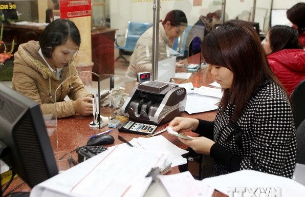 Ngân hàng Nhà nước Việt Nam chuẩn bị Tờ trình của Chính phủ về dự thảo Nghị quyết về xử lý nợ xấu của các tổ chức tín dụng (lần 2). ảnh minh họa: TTXVN. Ngân hàng Nhà nước Việt Nam chuẩn bị Tờ trình của Chính phủ về dự thảo Nghị quyết về xử lý nợ xấu của các tổ chức tín dụng (lần 2). ảnh minh họa: TTXVN.