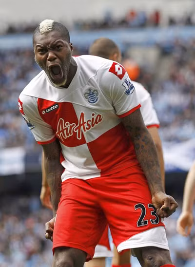 Cisse ăn mừng bàn san bằng tỷ số 1-1.