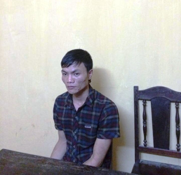 Đối tượng phạm tội bị bắt giữ để lấy lời khai Đối tượng phạm tội bị bắt giữ để lấy lời khai