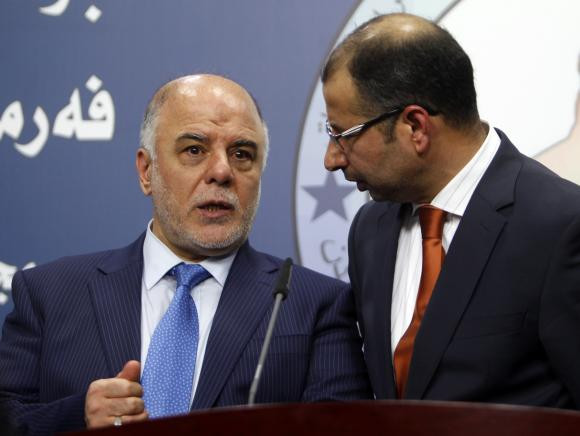 Tân Thủ tướng Iraq Maliki Haider al-Abadi (trái). Tân Thủ tướng Iraq Maliki Haider al-Abadi (trái).