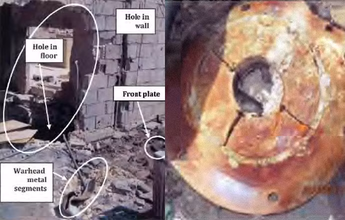 Hố trên tường và trên mặt đất do tên lửa gây ra.