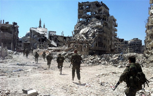 Quân đội Syria chến đấu tại Homs ngày 29/7. Quân đội Syria chến đấu tại Homs ngày 29/7.