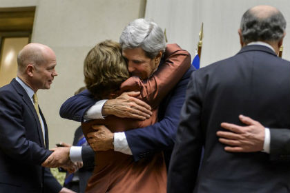 Các nhà ngoại giao ăn mừng sau khi đạt được thỏa thuận mang tính bước ngoặt nhằm kiềm chế chương trình hạt nhân của Tehran trong một bước tiến đầu tiên hướng tới việc giải quyết bế tắc của mối nguy hiểm kéo dài một thập kỷ. Các nhà ngoại giao ăn mừng sau khi đạt được thỏa thuận mang tính bước ngoặt nhằm kiềm chế chương trình hạt nhân của Tehran trong một bước tiến đầu tiên hướng tới việc giải quyết bế tắc của mối nguy hiểm kéo dài một thập kỷ.