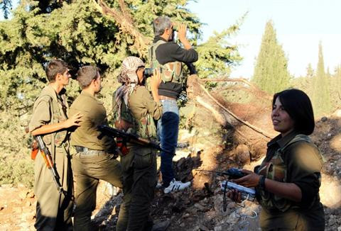 Các chiến binh người Kurd tại Syria. Các chiến binh người Kurd tại Syria.