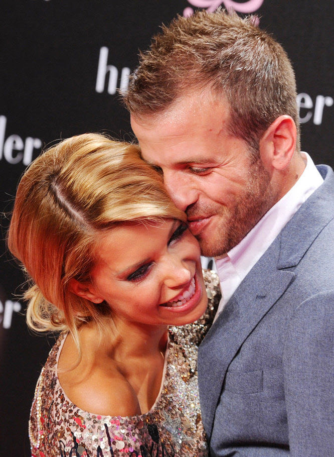 Rafael Van Der Vaart và bà xã Sylvie van der Vaart tại Tuần lễ thời trang Berlin Rafael Van Der Vaart và bà xã Sylvie van der Vaart tại Tuần lễ thời trang Berlin