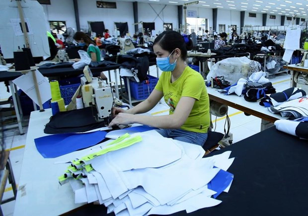 Sản xuất các mặt hàng may mặc xuất khẩu. (Ảnh: Phạm Kiên/TTXVN) Sản xuất các mặt hàng may mặc xuất khẩu. (Ảnh: Phạm Kiên/TTXVN)