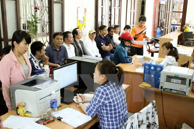 Chính phủ tiếp tục siết chặt chi tiêu ngân sách, đảm bảo hiệu quả hoạt động của bộ máy công chức, viên chức nhà nước. ảnh minh họa: TTXVN.