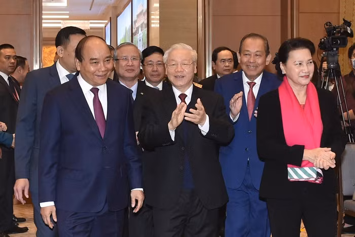 Tổng Bí thư, Chủ tịch nước Nguyễn Phú Trọng, Thủ tướng Nguyễn Xuân Phúc, Chủ tịch Quốc hội Nguyễn Thị Kim Ngân và các đại biểu dự hội nghị tại điểm cầu Hà Nội. Ảnh: Thống Nhất/TTXVN.