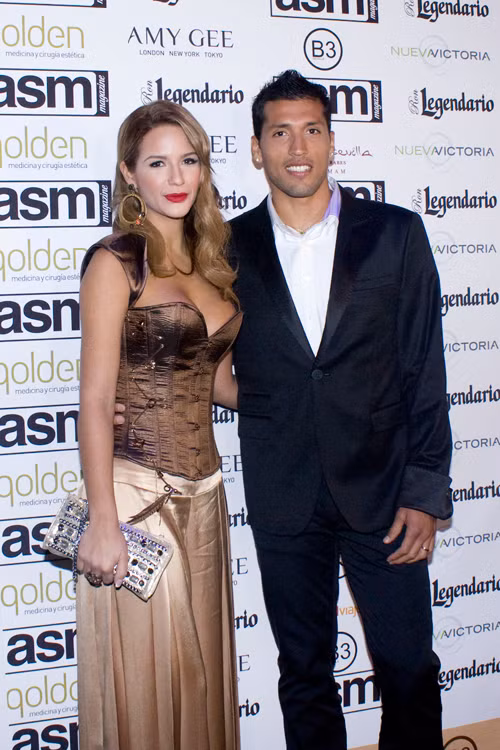 Trung vệ Garay của Real Madrid cùng bạn gái Tamara Gorro.