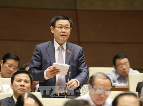 Phó Thủ tướng Vương Đình Huệ khẳng định: "Không bao giờ có chủ trương phá giá đồng tiền để hỗ trợ cho xuất khẩu". ảnh: TTXVN. Phó Thủ tướng Vương Đình Huệ khẳng định: "Không bao giờ có chủ trương phá giá đồng tiền để hỗ trợ cho xuất khẩu". ảnh: TTXVN.