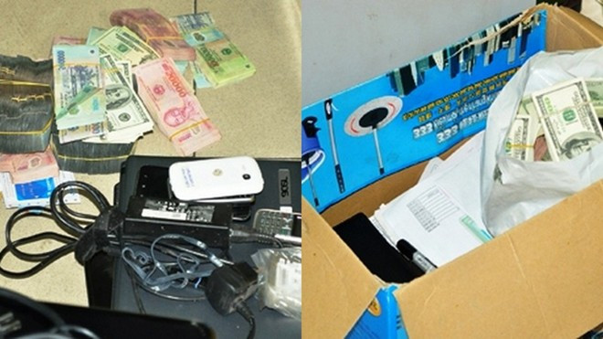 Máy tính và tiền mặt được thu giữ tại nhà của các đối tượng trong đường dây này.