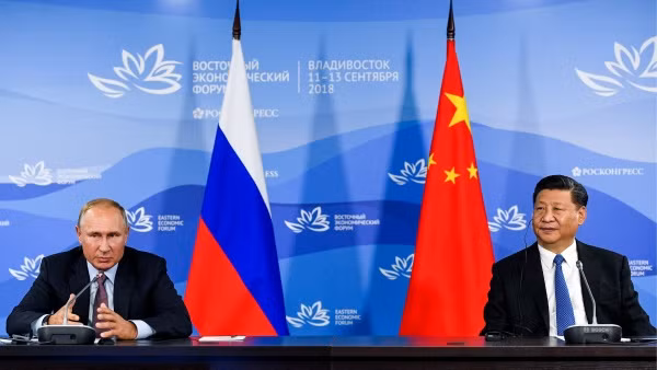 Tổng thống Nga Vladimir Putin và Chủ tịch Trung Quốc Tập Cận Bình, ảnh: Russia Today.