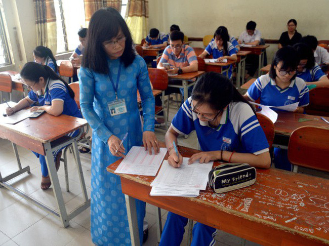 Giám thị coi thi (Ảnh minh họa: TTXVN). Giám thị coi thi (Ảnh minh họa: TTXVN).