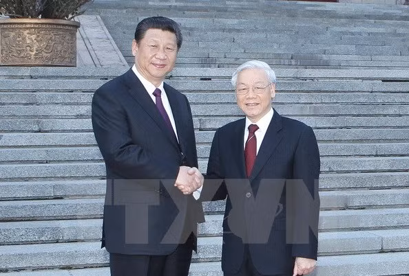 Tổng Bí thư, Chủ tịch nước Trung Quốc Tập Cận Bình đón Tổng Bí thư Nguyễn Phú Trọng. ảnh: TTXVN