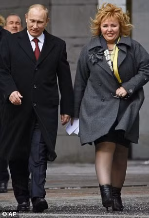 Vợ chồng Tổng thống Putin đi bầu cử hôm 4/3/2012.