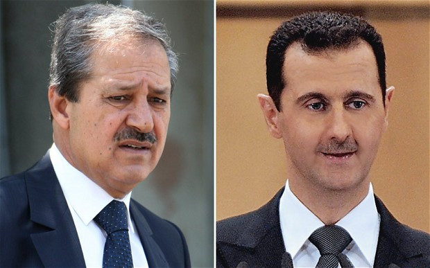 Cựu đại sứ Syria tại Iraq Nawaf Fares (trái) và Tổng thống Bashar al-Assad. Cựu đại sứ Syria tại Iraq Nawaf Fares (trái) và Tổng thống Bashar al-Assad.