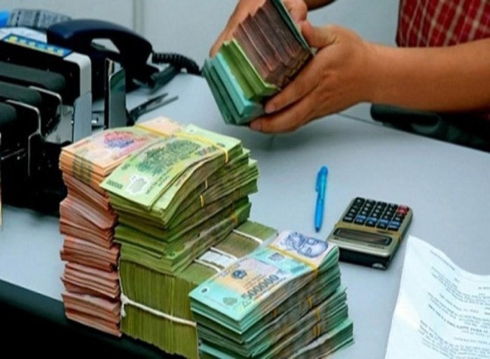 Người lao động sẽ được truy lĩnh khoản chênh lệch giữa lương mới và lương cũ (Ảnh minh họa: VOV.vn) tienvov-1-7359-5782.jpg