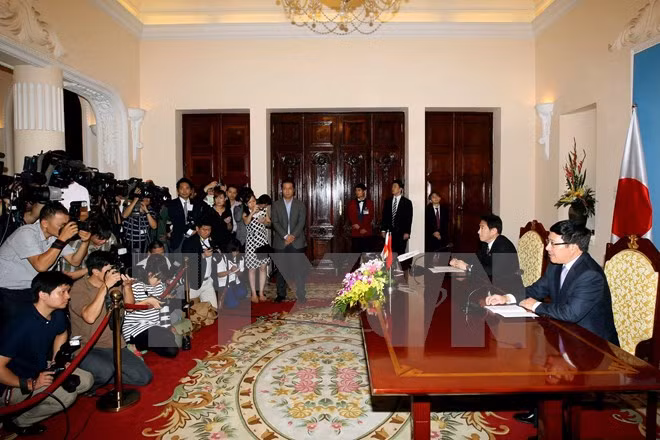 Phóng viên tác nghiệp trong một sự kiện đối ngoại. ảnh: TTXVN.