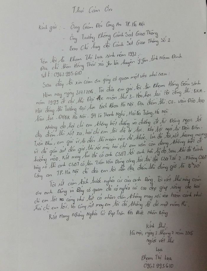 Lá thư của chị Phạm Thị Lụa cảm ơn hành động đẹp của chiến sĩ Đội Cảnh sát Giao thông số 2. ảnh: Ngọc Quang.