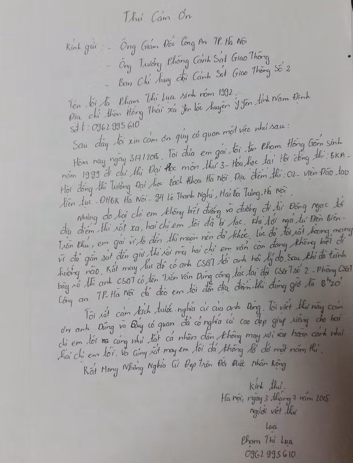 Lá thư của chị Phạm Thị Lụa cảm ơn hành động đẹp của chiến sĩ Đội Cảnh sát Giao thông số 2. ảnh: Ngọc Quang.