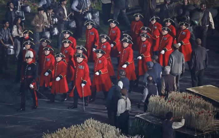 Những trưởng lão người Trung Quốc diễu hành trong lễ khai mạc.