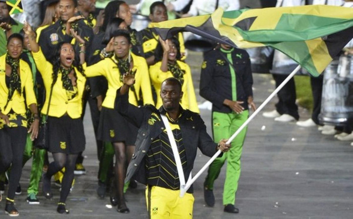 Usain Bolt dẫn đầu những người Jamaica. Usain Bolt dẫn đầu những người Jamaica.