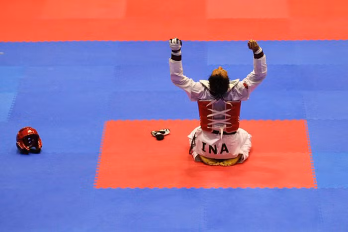 Nugroho Basuki (Indonesia) ăn mừng sau khi đánh bại Anthony Soriano Jose (Philippines) trong trận chung kết taekwondo hạng cân dưới 87kg. Nugroho Basuki (Indonesia) ăn mừng sau khi đánh bại Anthony Soriano Jose (Philippines) trong trận chung kết taekwondo hạng cân dưới 87kg.