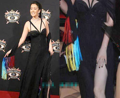 Củng Lợi cũng luôn biết cách khoe khéo lợi thế của cơ thể, bằng cách... xẻ váy.