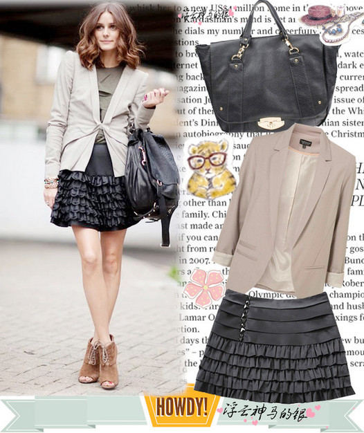 Olivia Palermo lại thanh lịch khi diện váy xếp tầng cùng áo khoác tối màu.