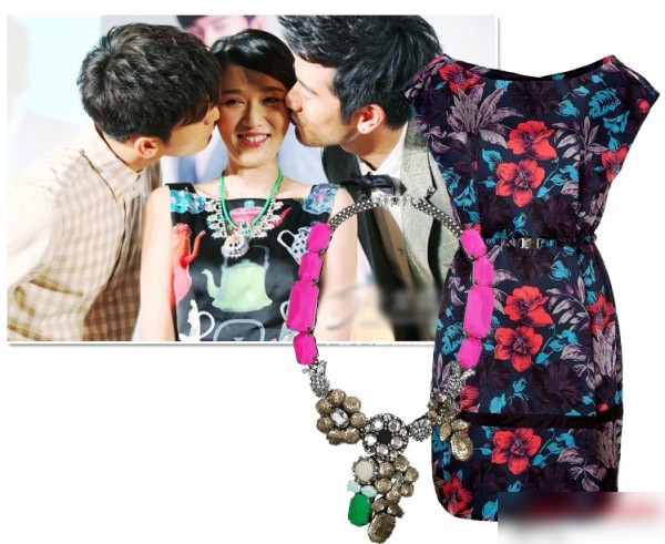 Thanh lịch, quý phái với váy hoa đen đỏ cùng vòng cổ sành điệu.