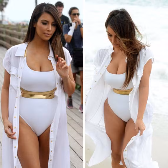Xuất hiện trên bãi biển Miami cách đây ít ngày, cô Kim gây bất ngờ với bộ bikini liền thân và áo khoác bên ngoài.