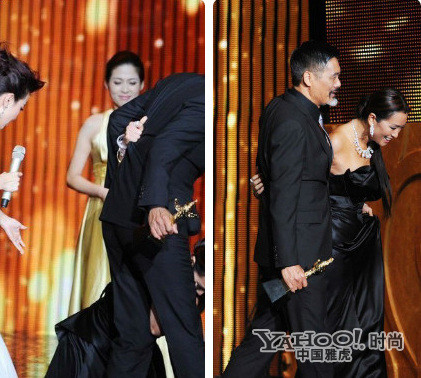 Phải nhờ đến sự hỗ trợ hết mức của người bên cạnh Củng Lợi mới có thể đứng lên được. Phải nhờ đến sự hỗ trợ hết mức của người bên cạnh Củng Lợi mới có thể đứng lên được.